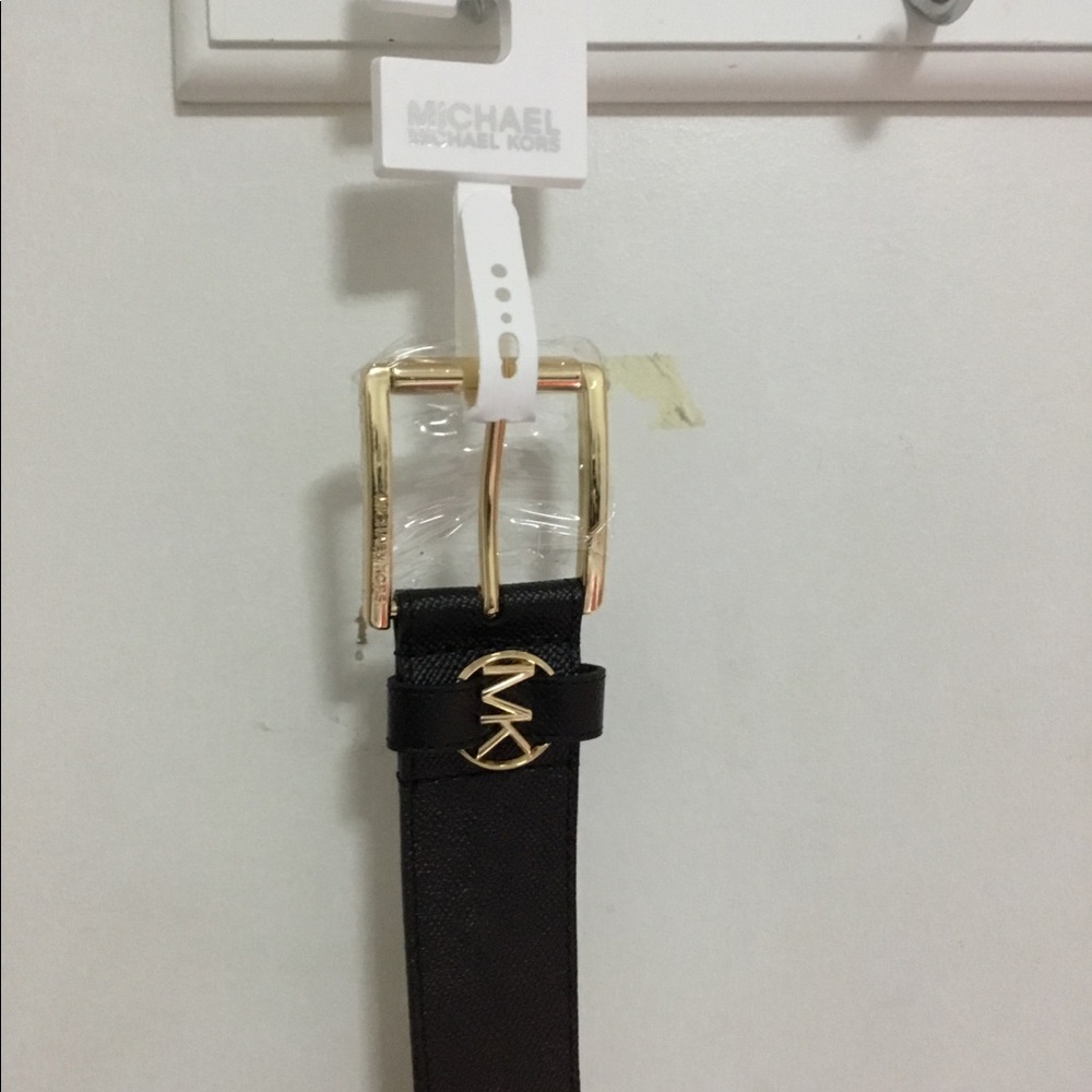 Michael Kors black leather gold buckle belt.